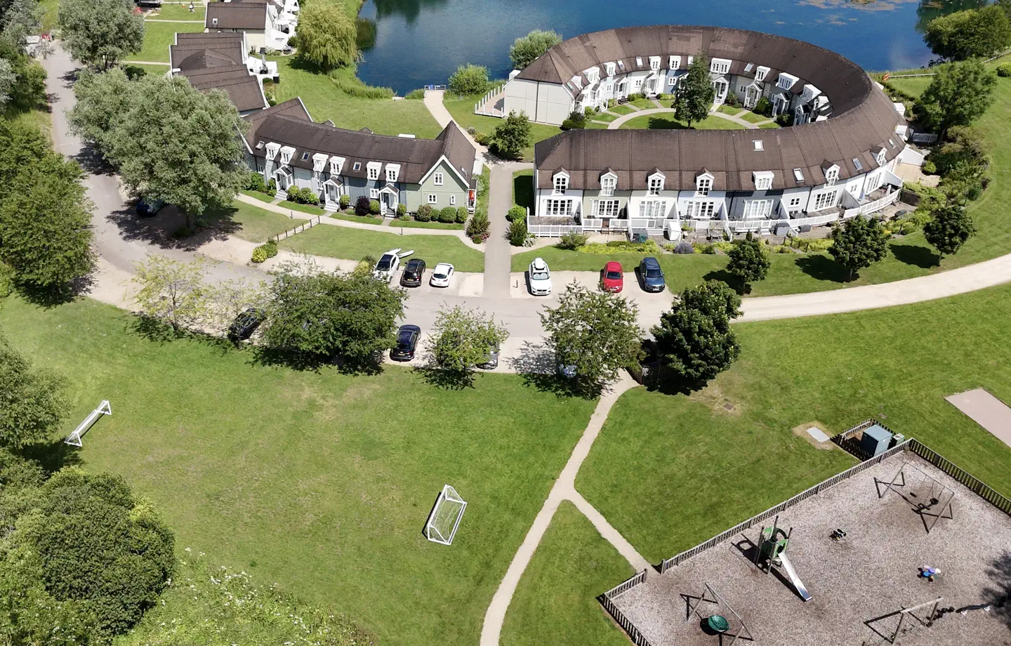 The mini football pitch and children's playground beside Isis Lake