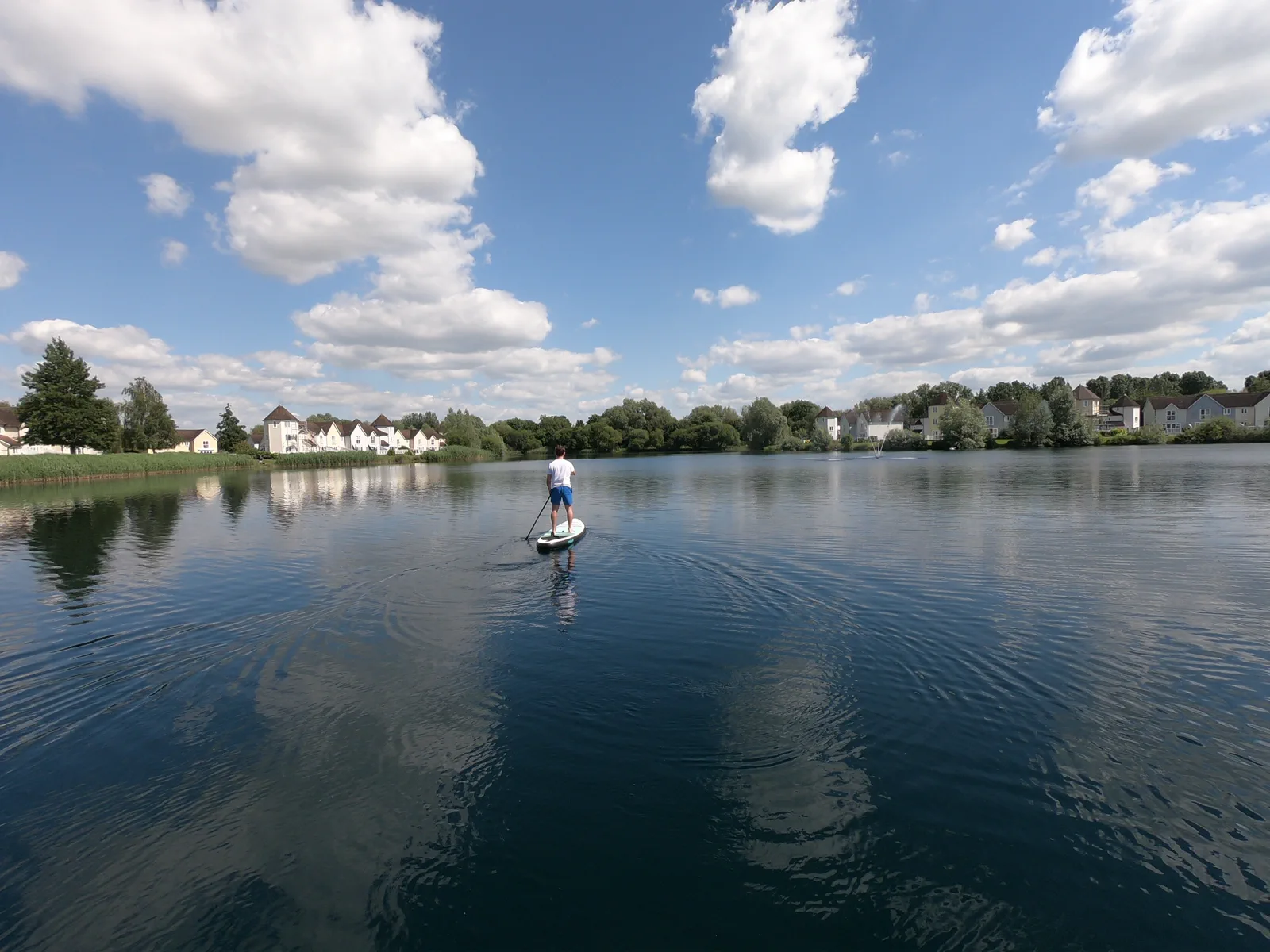Stand-up paddleboarding on Windrush Lake