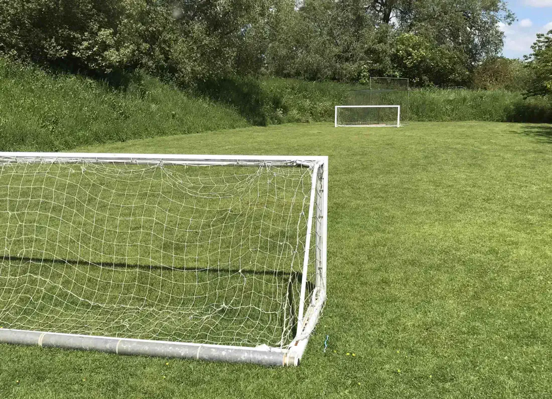 The mini football pitch near the lodges