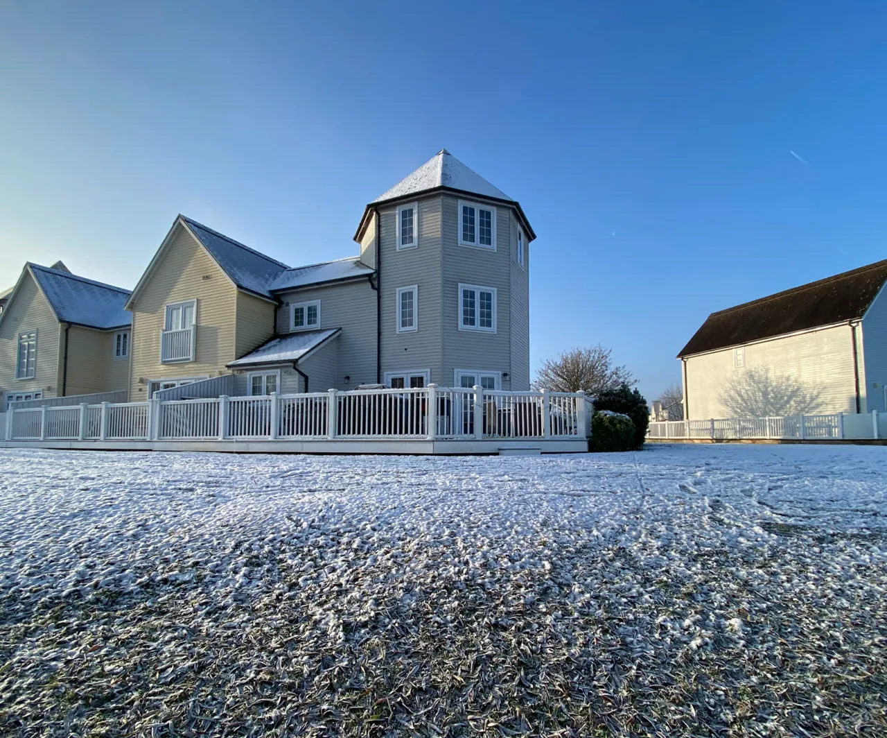 Grey Heron Lodge by the lake on a crisp winter's day