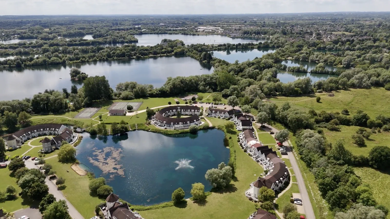 An aerial view of Isis Lake and the surrounding water park